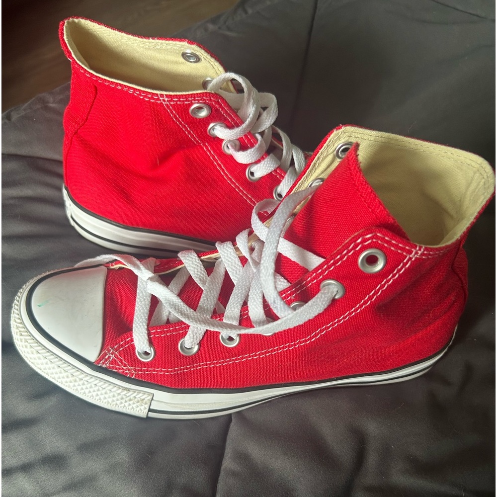 Selling converse sneakers, never worn. Red, high top, 7.5 the size.